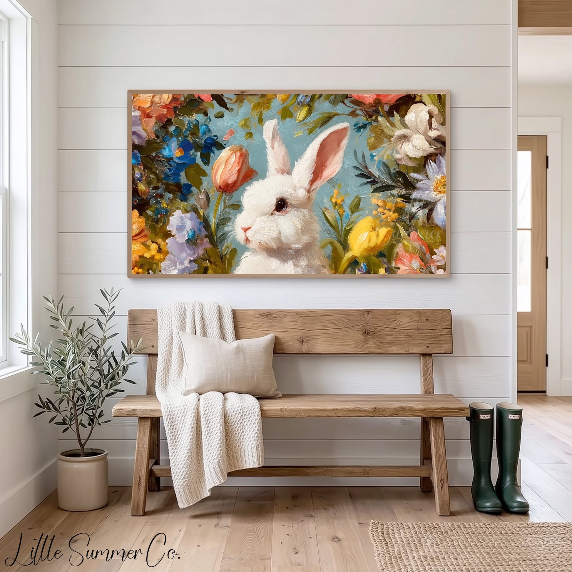 White Bunny Among Spring Flowers Frame TV Art displayed on a TV