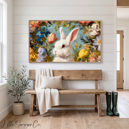 White Bunny Among Spring Flowers Frame TV Art displayed on a TV