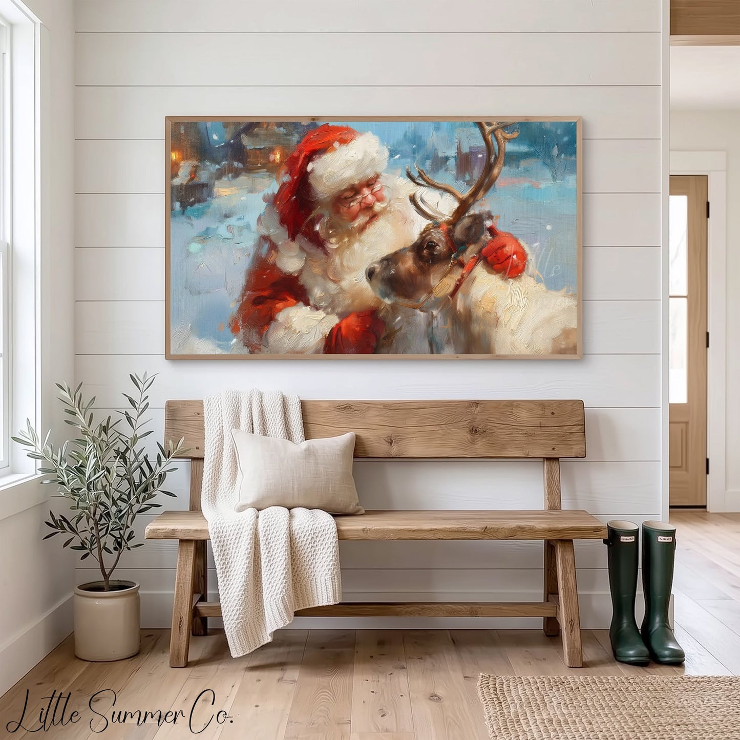 Santa and Reindeer in Snow Frame TV Art displayed on a TV