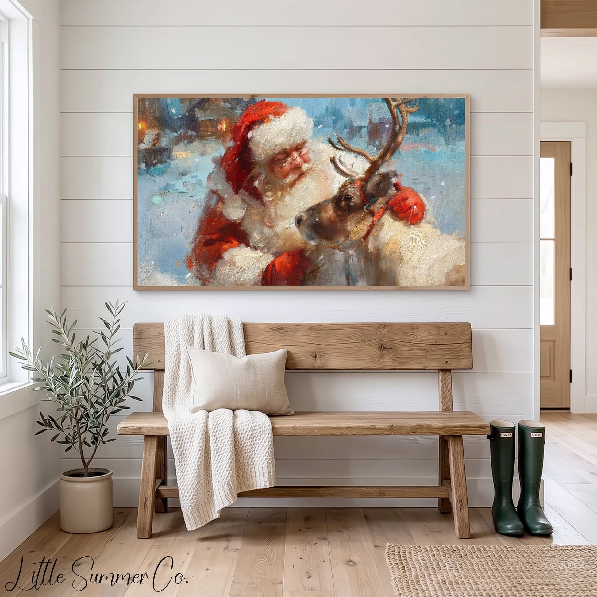 Santa and Reindeer in Snow Frame TV Art displayed on a TV
