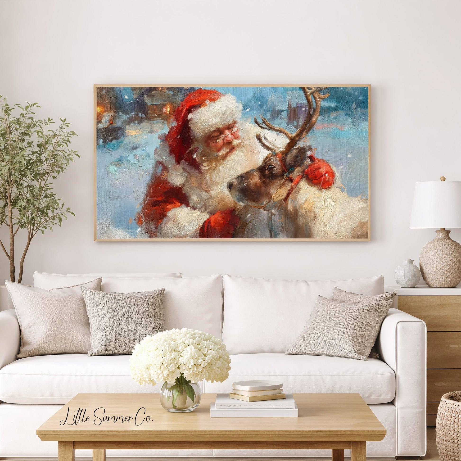 Santa and Reindeer in Snow Frame TV Art displayed on a TV
