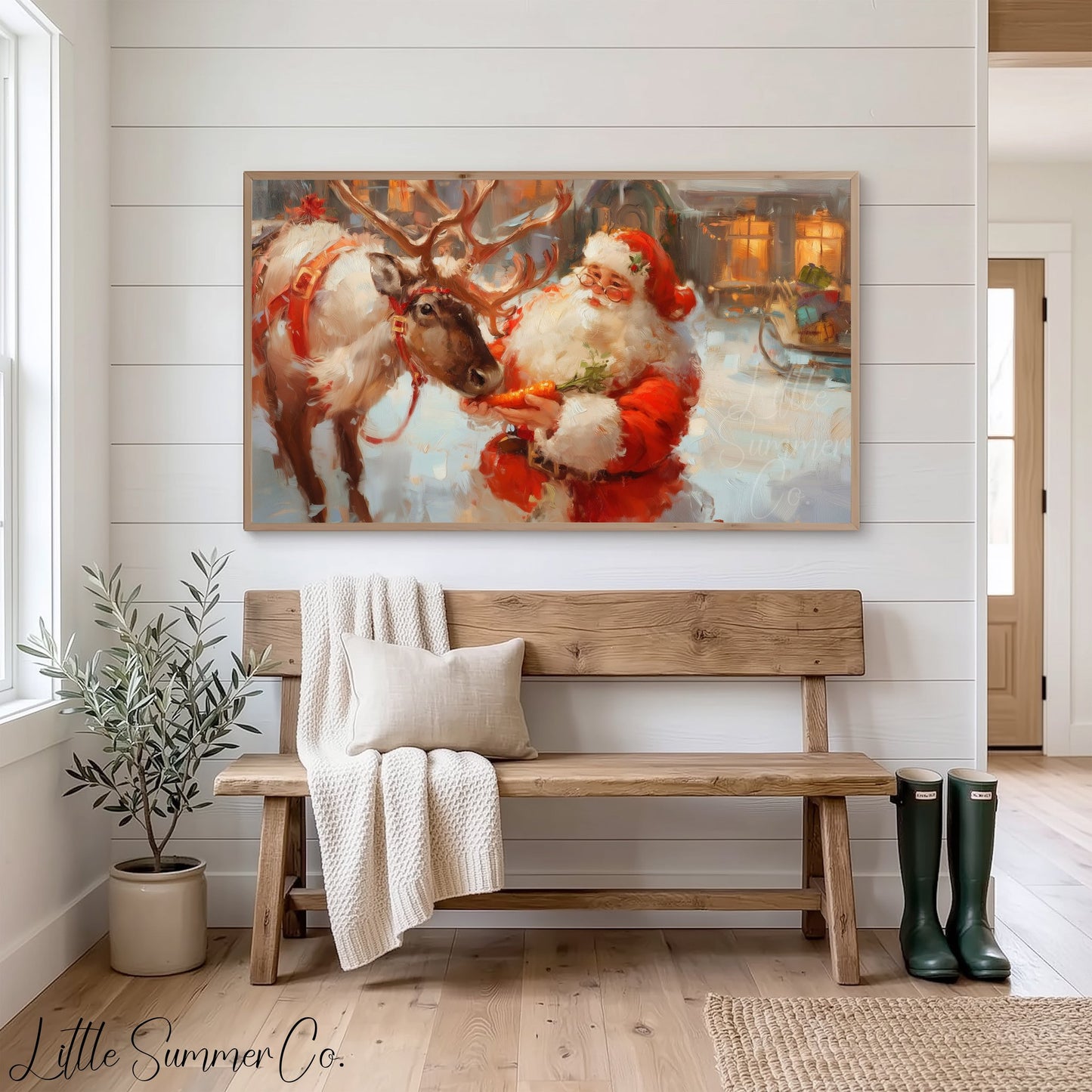 Santa Feeding a Reindeer Frame TV Art displayed on a TV