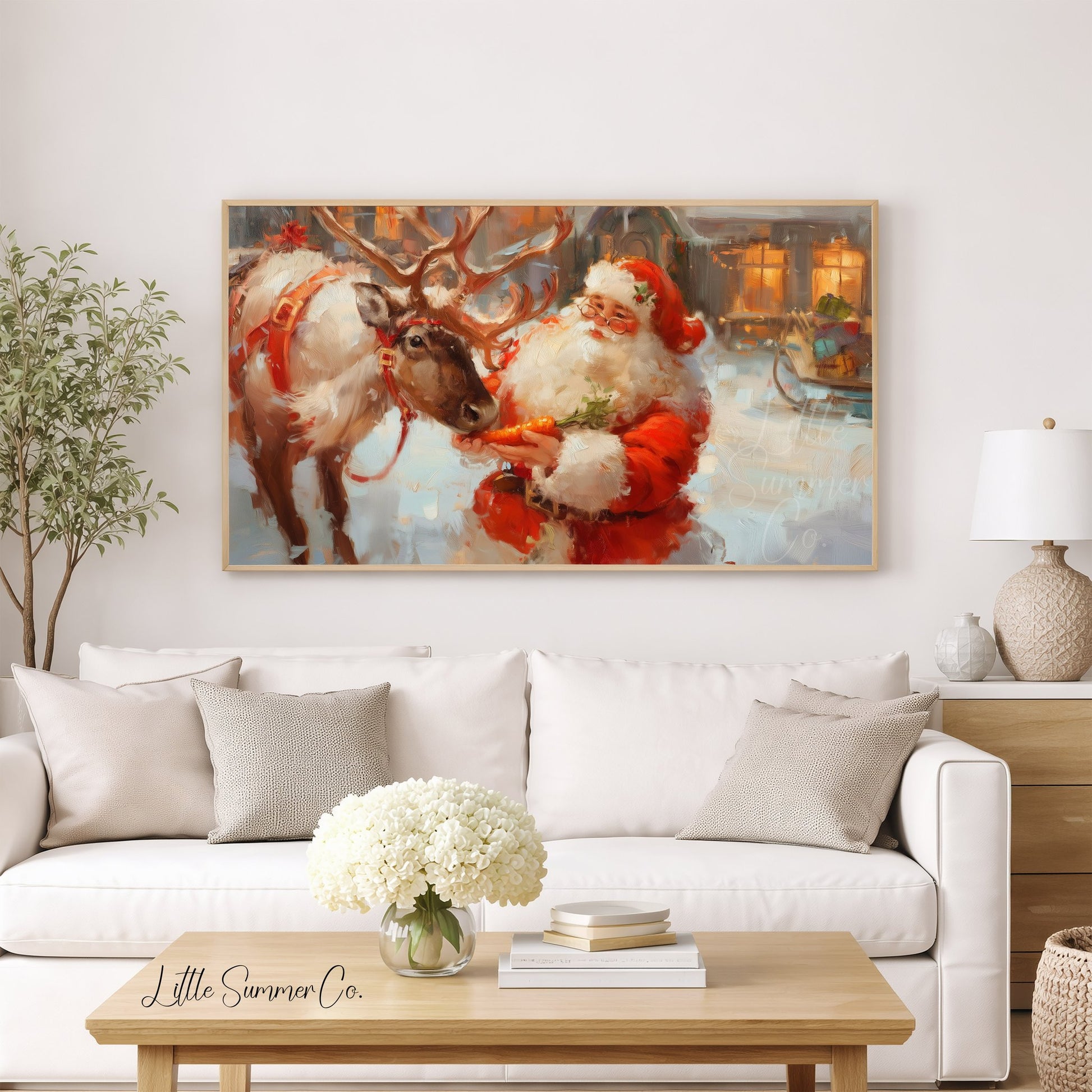 Santa Feeding a Reindeer Frame TV Art displayed on a TV