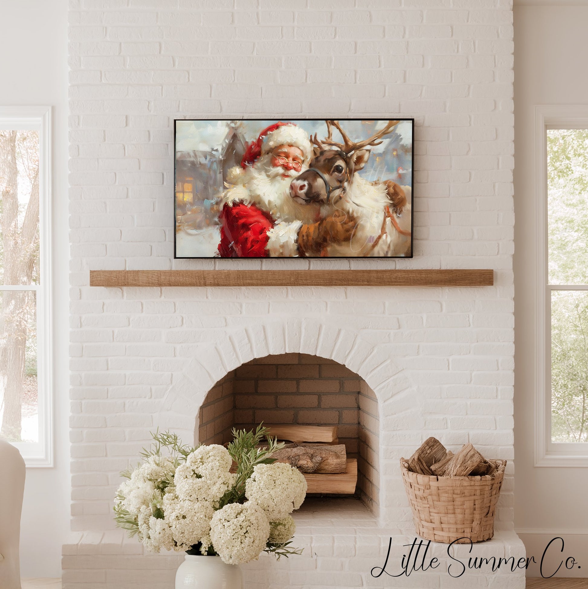 Santa Hugging a Reindeer Frame TV Art displayed on a TV