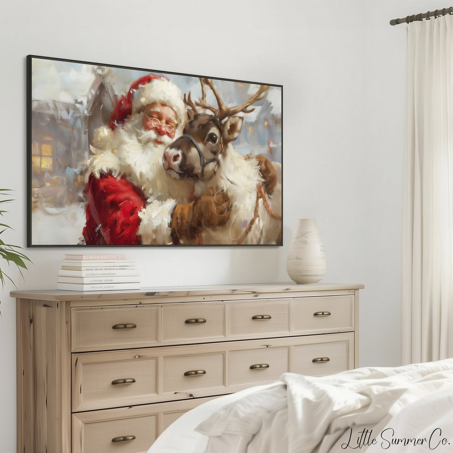 Santa Hugging a Reindeer Frame TV Art displayed on a TV