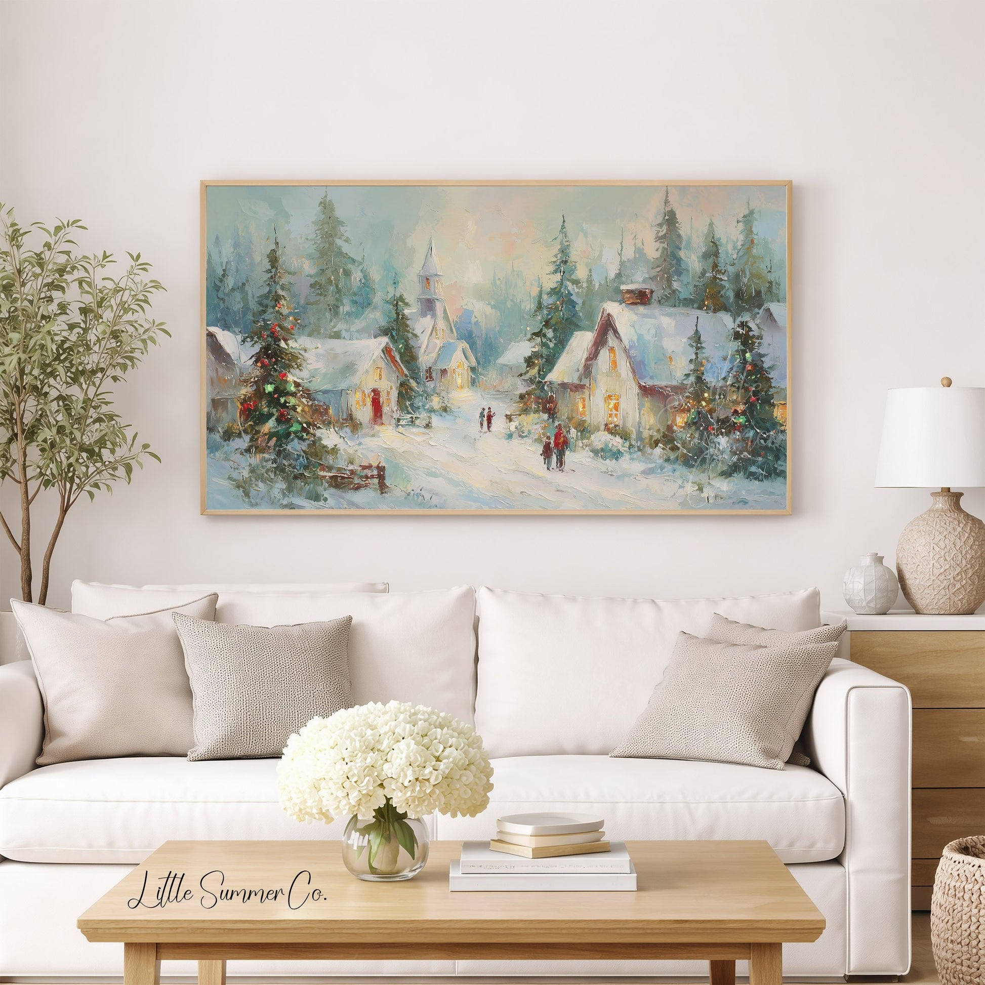 Snowy Christmas Village At Dusk Frame TV Art displayed on a TV