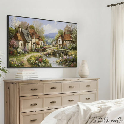 Cottage Village in Spring Frame TV Art displayed on a TV