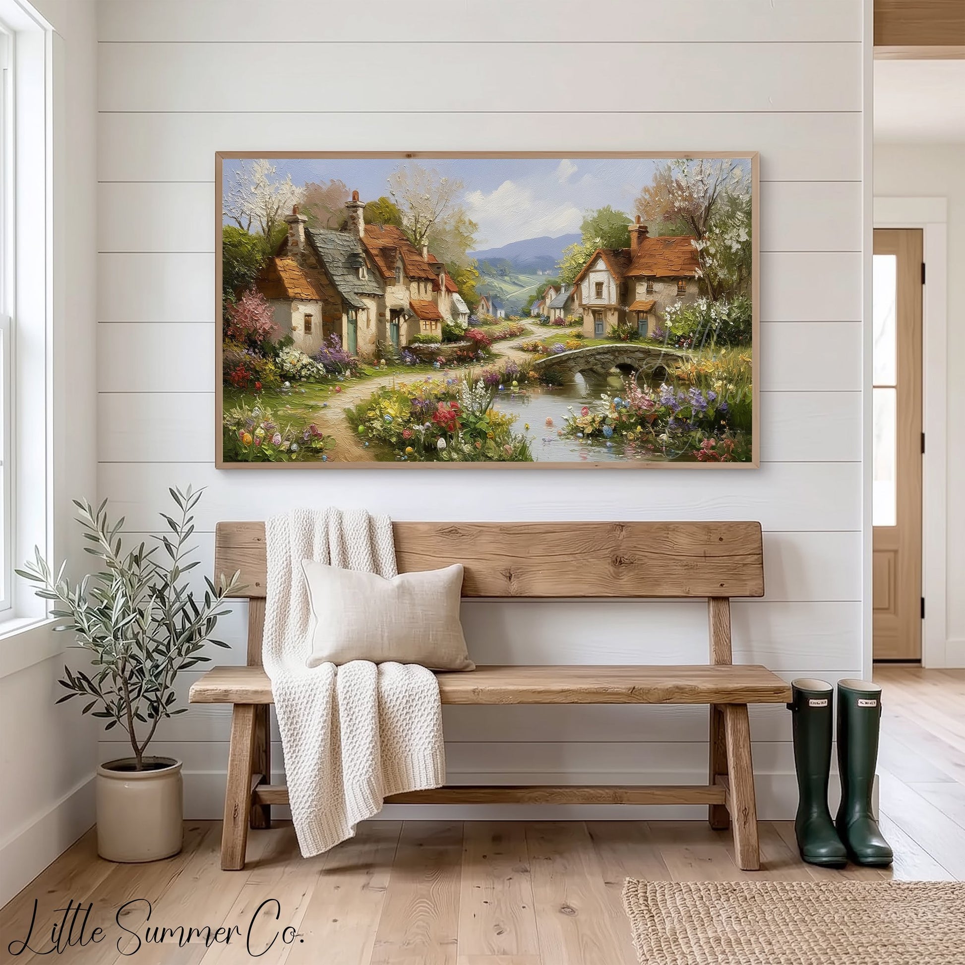 Cottage Village in Spring Frame TV Art displayed on a TV