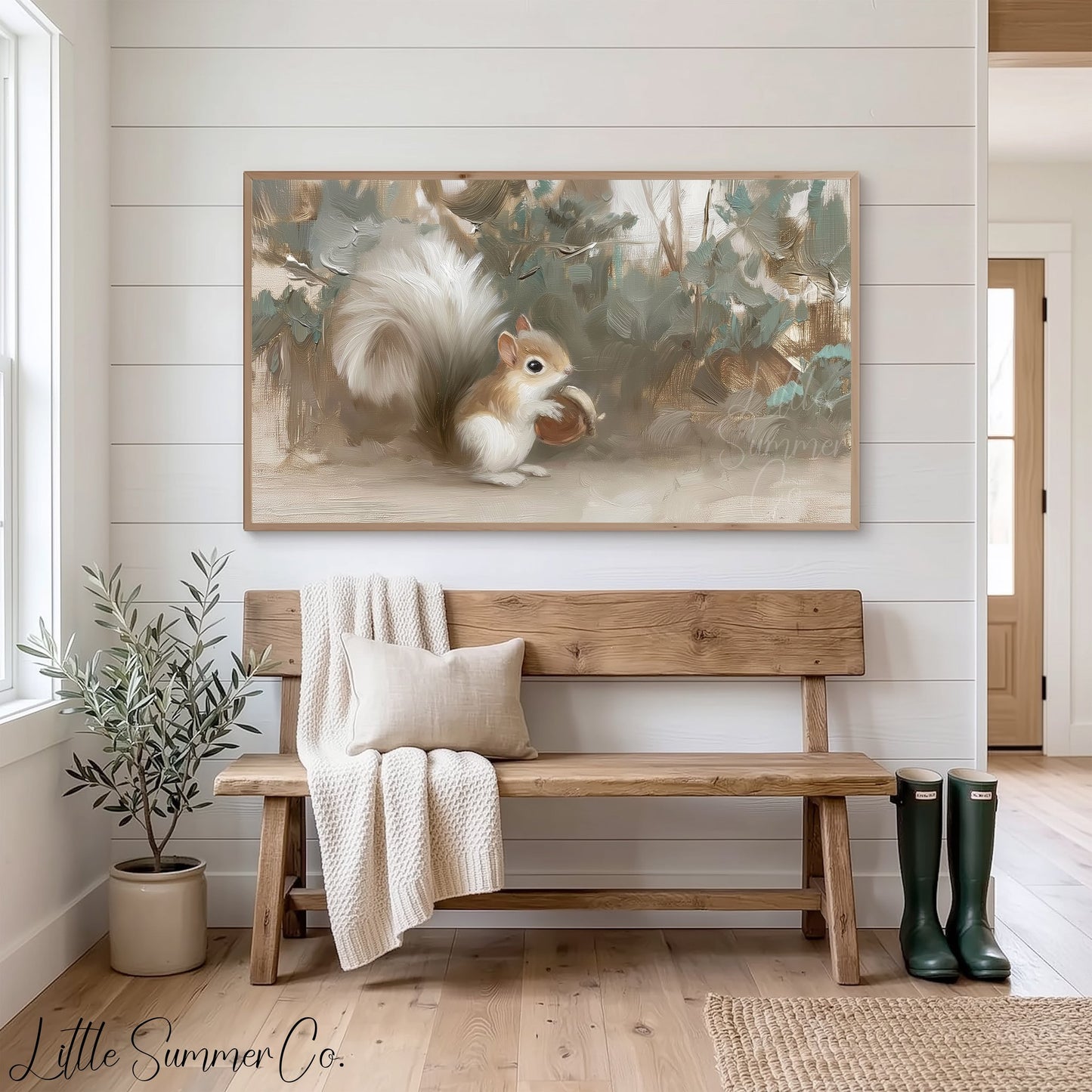 White Squirrel Holding Acorn Frame TV Art displayed on a TV