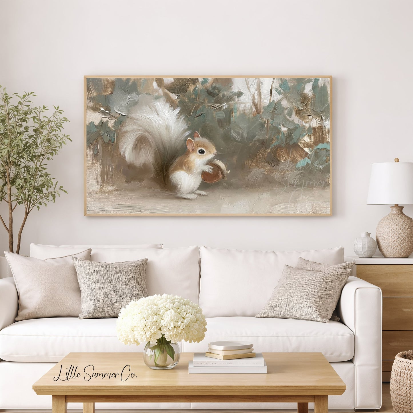 White Squirrel Holding Acorn Frame TV Art displayed on a TV