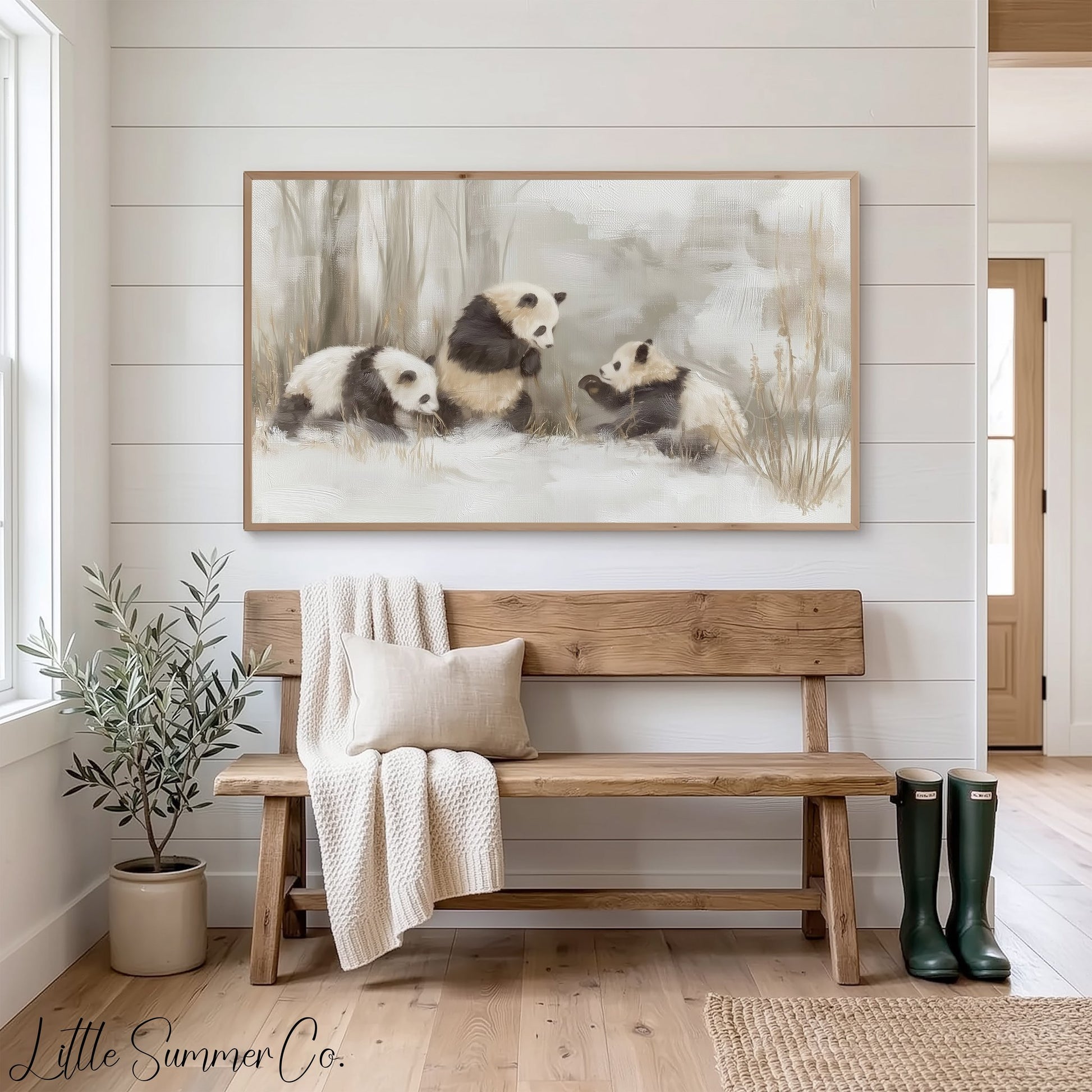 Panda Family in Snow Frame TV Art displayed on a TV