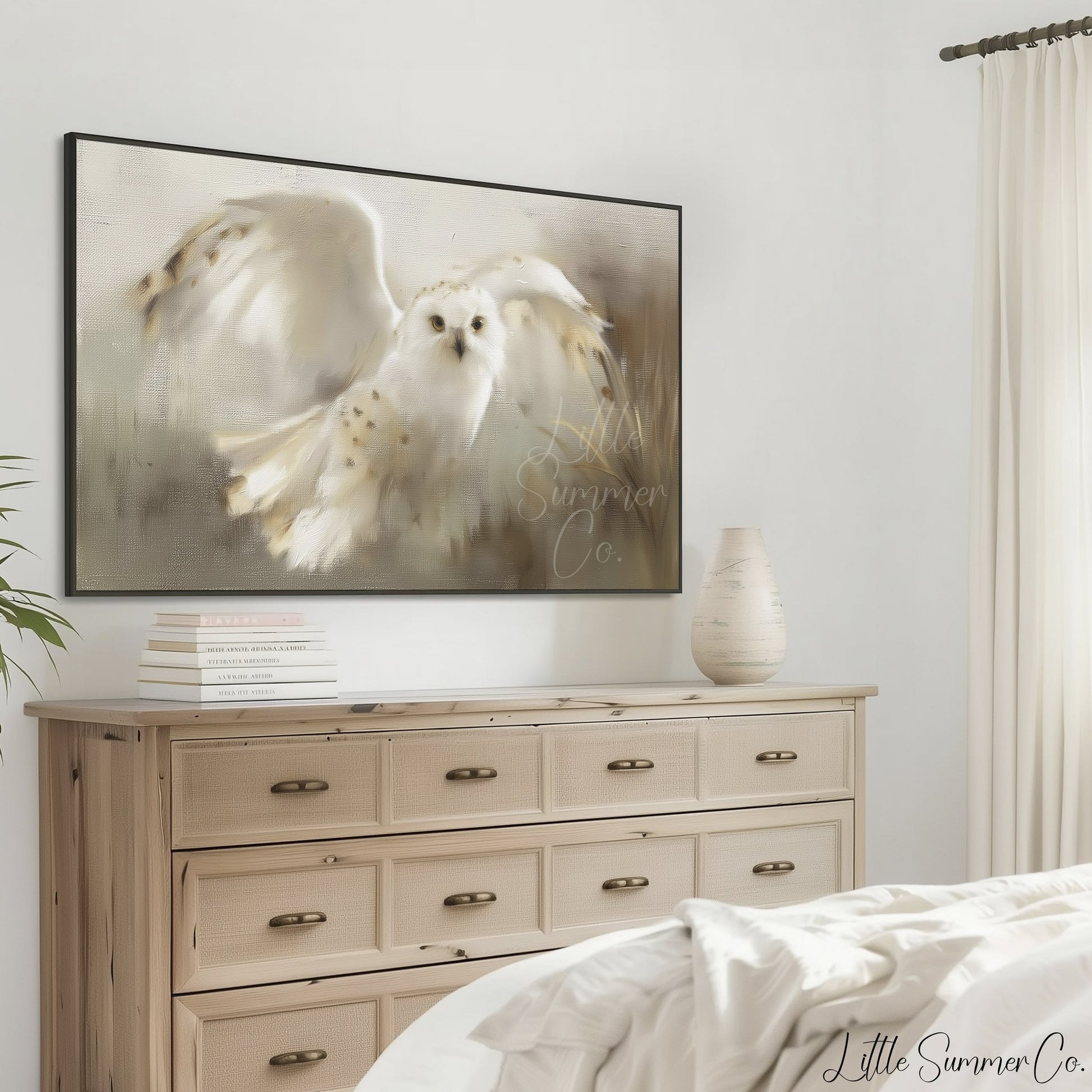 Snowy Owl in Flight Frame TV Art displayed on a TV
