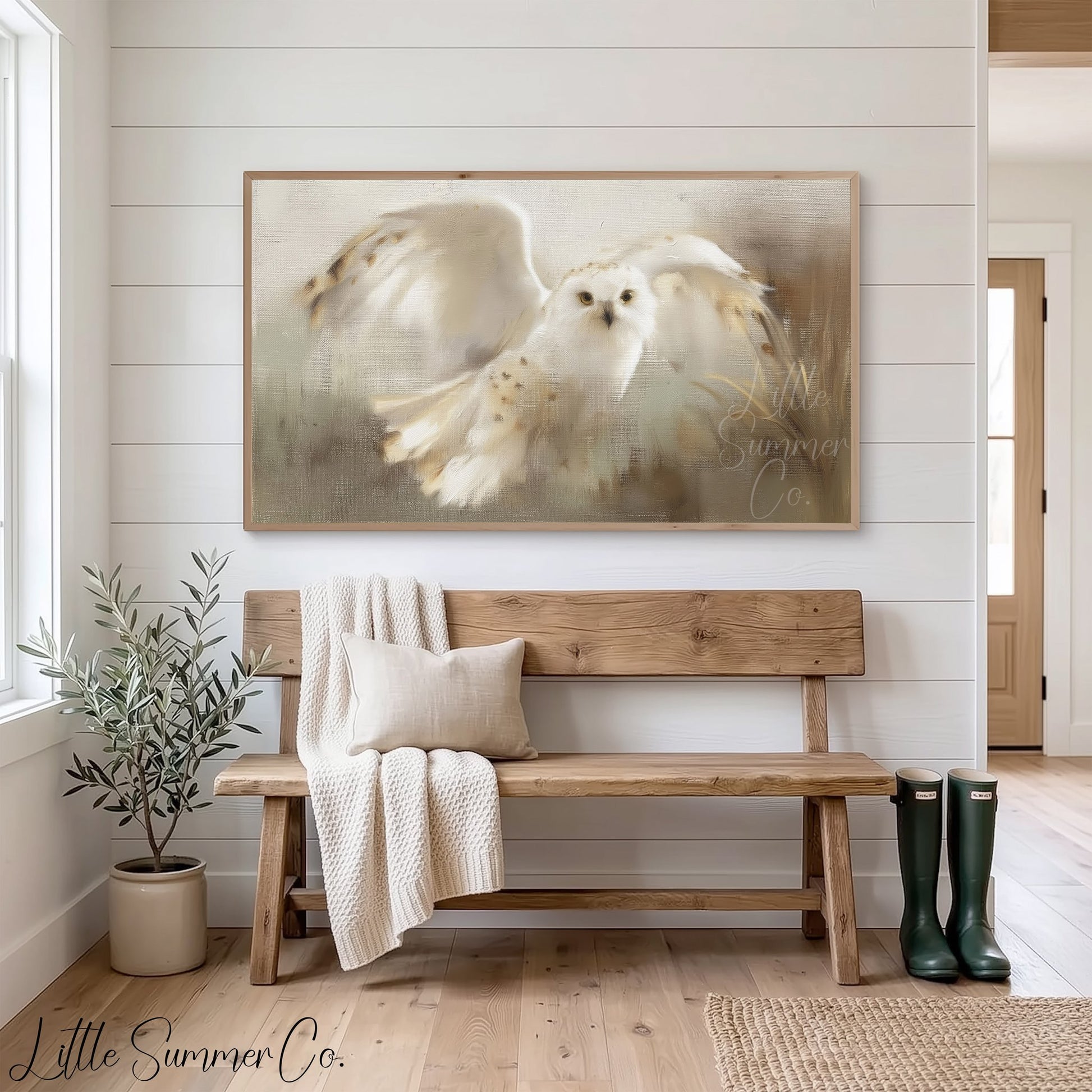 Snowy Owl in Flight Frame TV Art displayed on a TV