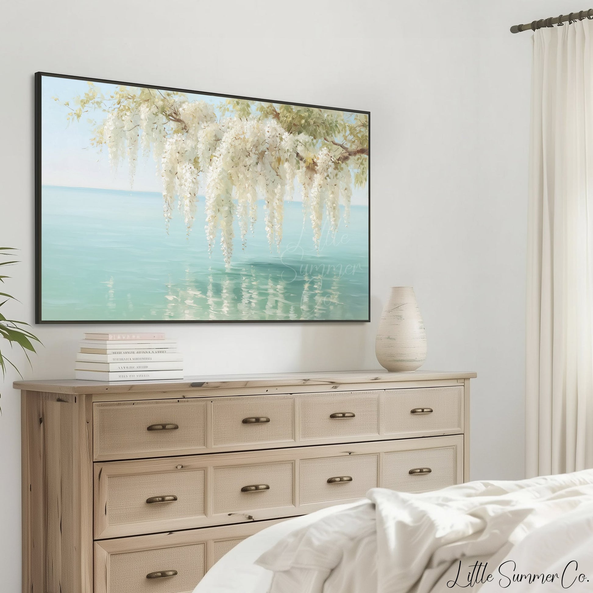 White Wisteria Over Coastal Water Frame TV Art displayed on a TV