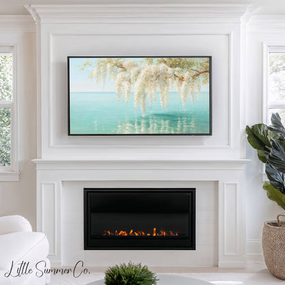 White Wisteria Over Coastal Water Frame TV Art displayed on a TV