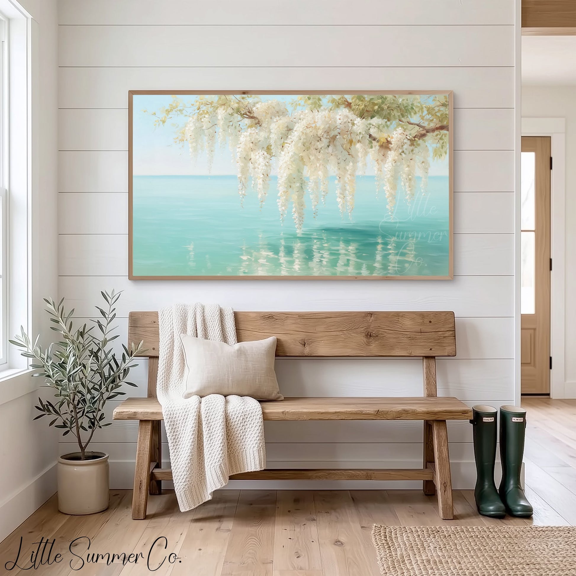 White Wisteria Over Coastal Water Frame TV Art displayed on a TV