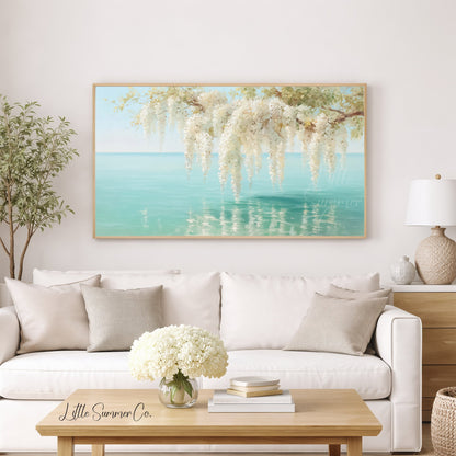 White Wisteria Over Coastal Water Frame TV Art displayed on a TV
