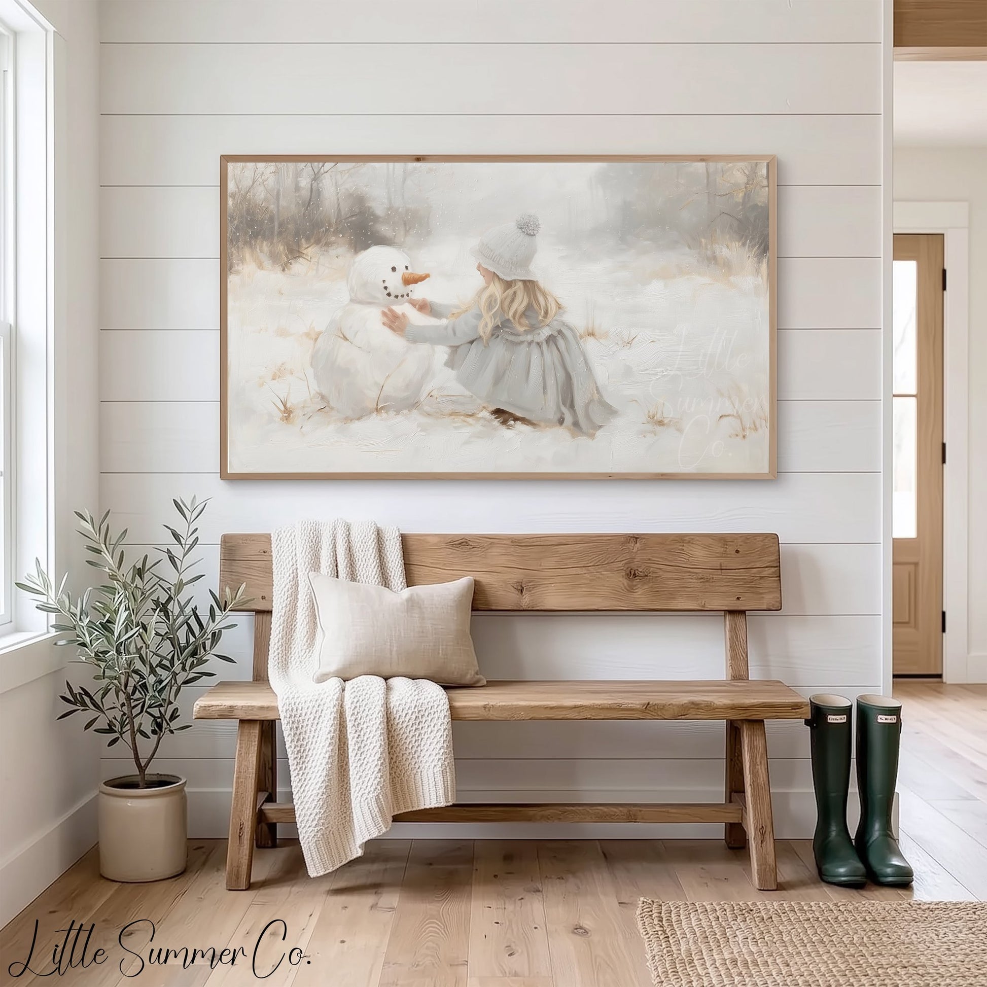 Girl Snowman Frame TV Art displayed on a TV